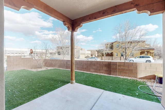 view of patio with fence