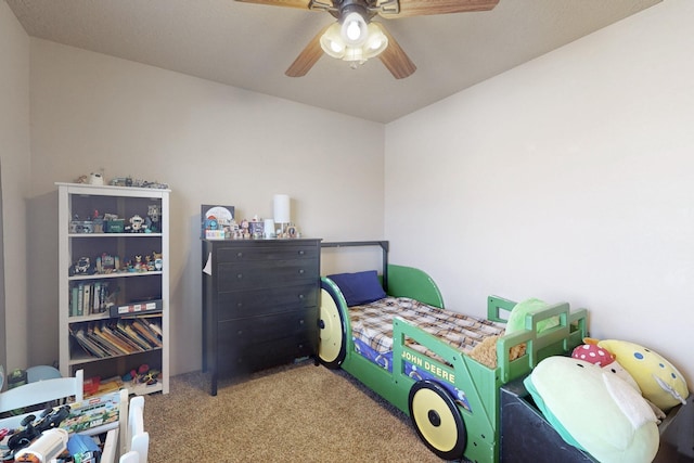 bedroom featuring carpet and ceiling fan