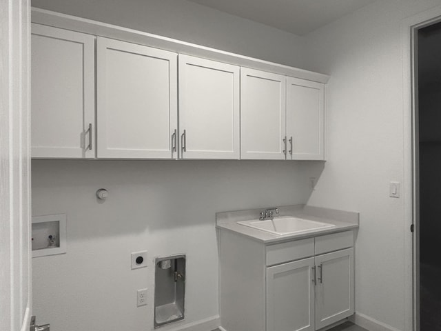 3340 Wolf Tail Loop NE, Rio Rancho, NM 87144 - laundry room featuring cabinet space, hookup for an electric dryer, hookup for a washing machine, and gas dryer hookup