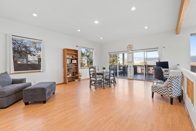 interior space featuring recessed lighting, beam ceiling, and light wood-style floors