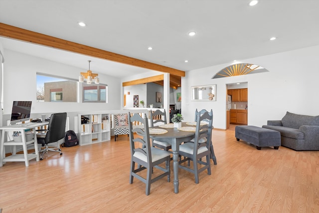 dining room with vaulted ceiling with beams, recessed lighting, a notable chandelier, and light wood finished floors