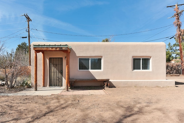 627 Fairway Rd NW, Albuquerque, NM 87107 - back of house with stucco siding