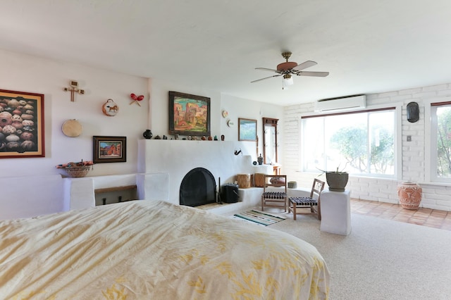 627 Fairway Rd NW, Albuquerque, NM 87107 - bedroom with a wall mounted air conditioner, multiple windows, a fireplace, and carpet flooring