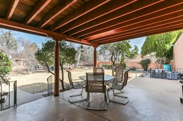 627 Fairway Rd NW, Albuquerque, NM 87107 - fenced backyard featuring a patio area and outdoor dining space