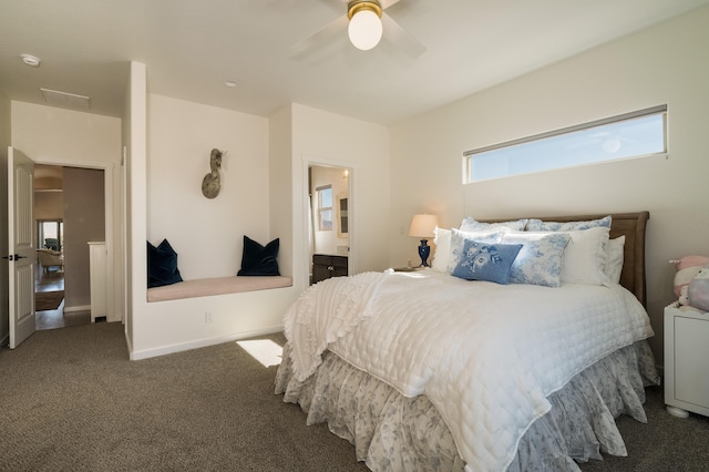 carpeted bedroom with a ceiling fan, baseboards, and ensuite bathroom