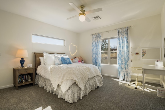 bedroom with baseboards, multiple windows, visible vents, and carpet flooring