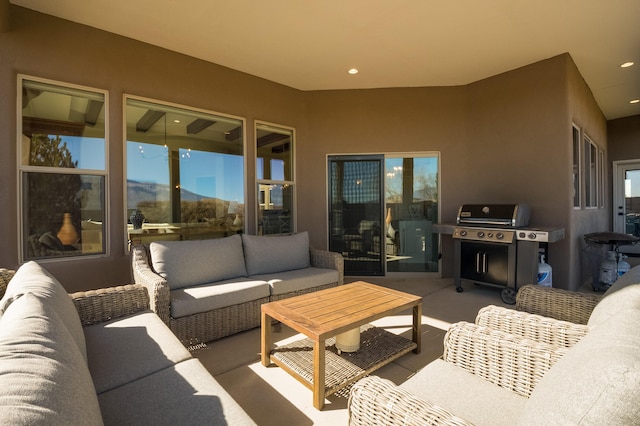 view of patio with a grill and an outdoor living space