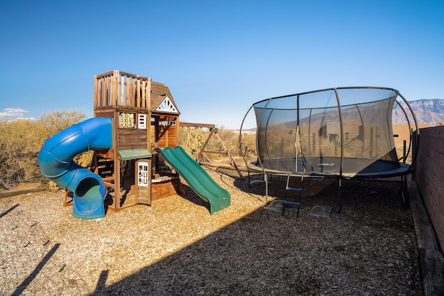 view of jungle gym featuring a trampoline