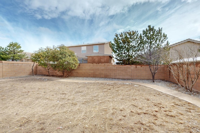 view of yard featuring a fenced backyard