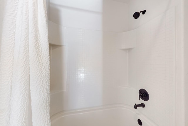 full bathroom featuring shower / tub combo with curtain