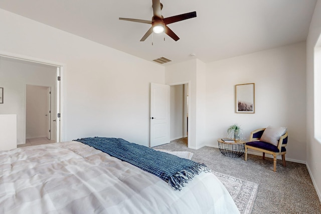 bedroom featuring visible vents, light carpet, baseboards, and a ceiling fan