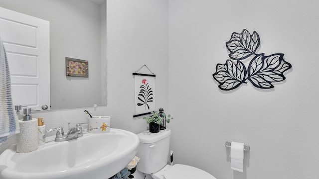 889 Tazanita Loop SE, Rio Rancho, NM 87124 - bathroom featuring a sink and toilet