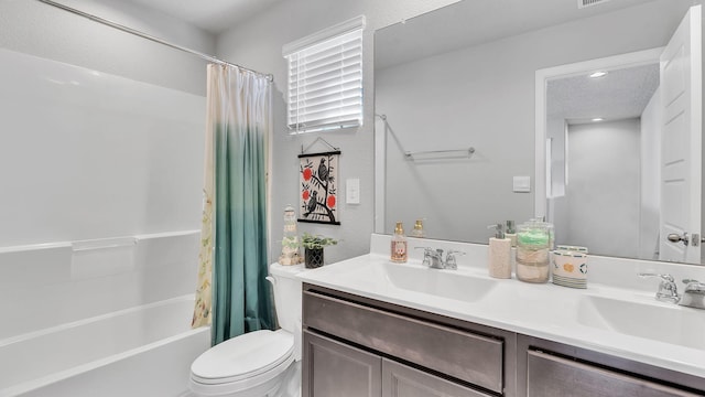 full bath featuring double vanity, shower / bathtub combination with curtain, toilet, and a sink