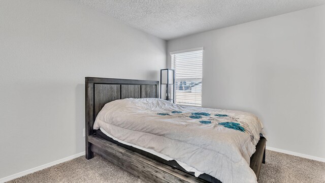 889 Tazanita Loop SE, Rio Rancho, NM 87124 - carpeted bedroom featuring baseboards and a textured ceiling