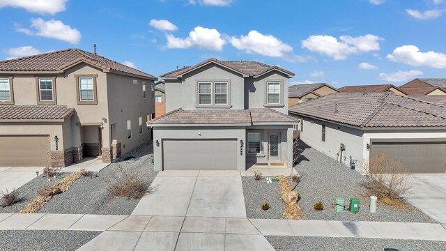 889 Tazanita Loop SE, Rio Rancho, NM 87124 - traditional-style house featuring stucco siding, driveway, an attached garage, a residential view, and stone siding