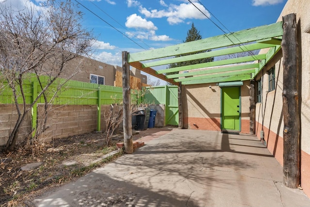 view of patio / terrace with fence