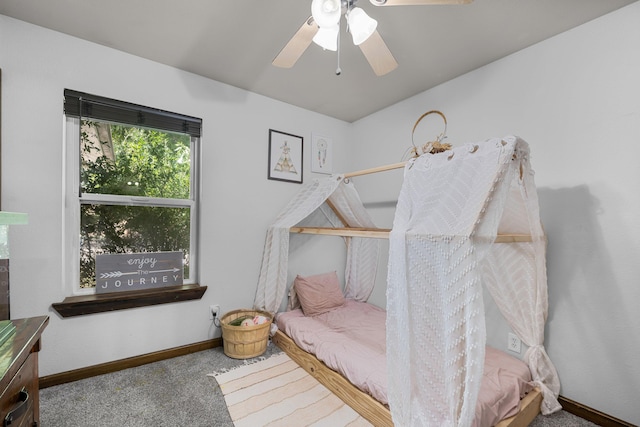 bedroom with baseboards, carpet floors, and ceiling fan