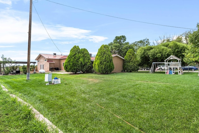 view of yard with a playground