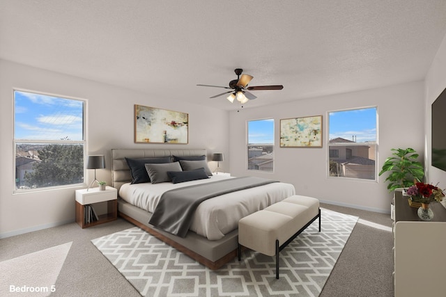 8104 Sleeping Bear Dr NW, Albuquerque, NM 87120 - bedroom featuring light carpet, a ceiling fan, and a textured ceiling