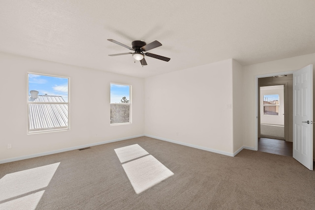 8104 Sleeping Bear Dr NW, Albuquerque, NM 87120 - carpeted spare room with a ceiling fan and baseboards