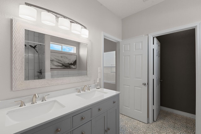 8104 Sleeping Bear Dr NW, Albuquerque, NM 87120 - bathroom with double vanity and a shower