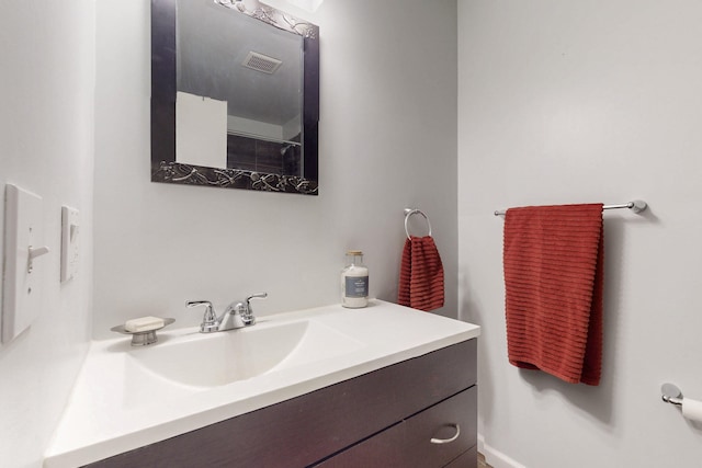 bathroom featuring visible vents and vanity