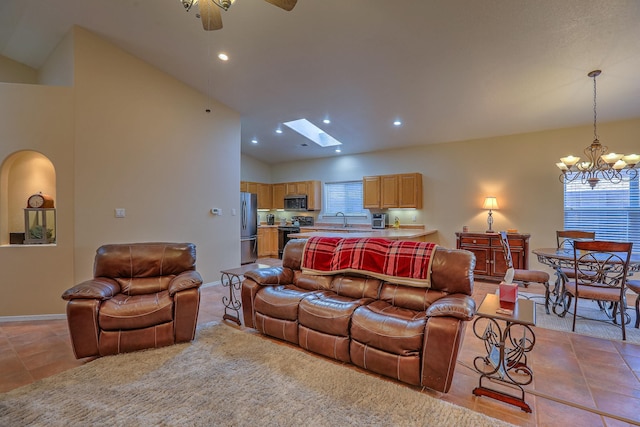 living area with baseboards, light tile patterned flooring, and recessed lighting