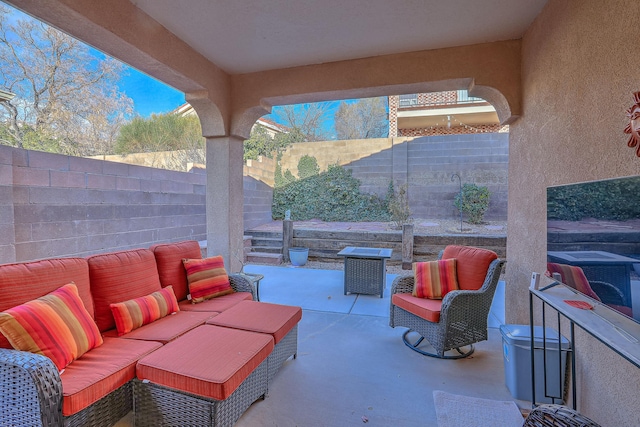 view of patio / terrace with a fenced backyard and an outdoor hangout area