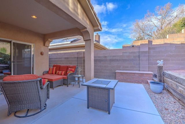 view of patio / terrace with fence and outdoor lounge area