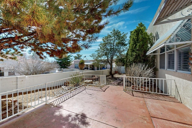 view of patio featuring a fenced backyard