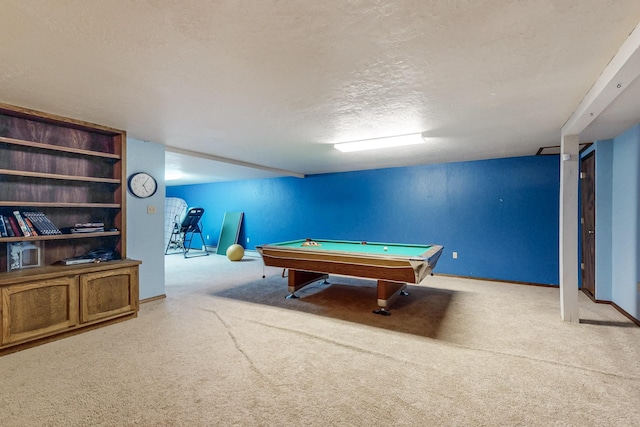 recreation room with carpet floors, billiards, a textured ceiling, and baseboards