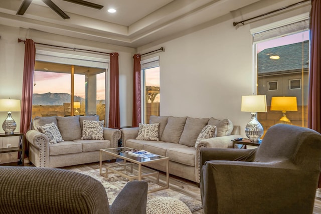 living area featuring recessed lighting, a ceiling fan, and wood finished floors