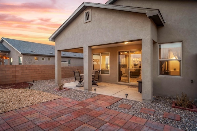 patio terrace at dusk with fence