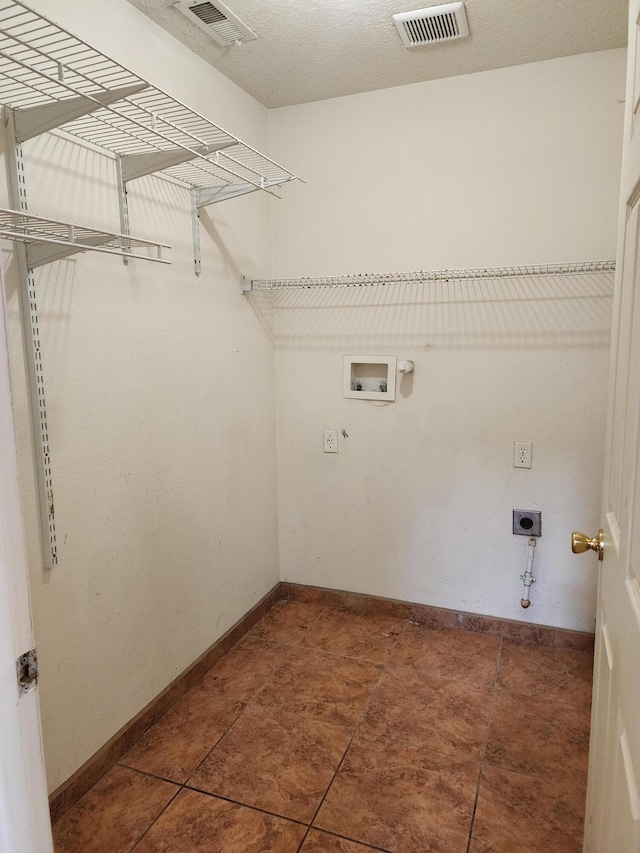 laundry room featuring electric dryer hookup, visible vents, washer hookup, hookup for a gas dryer, and laundry area