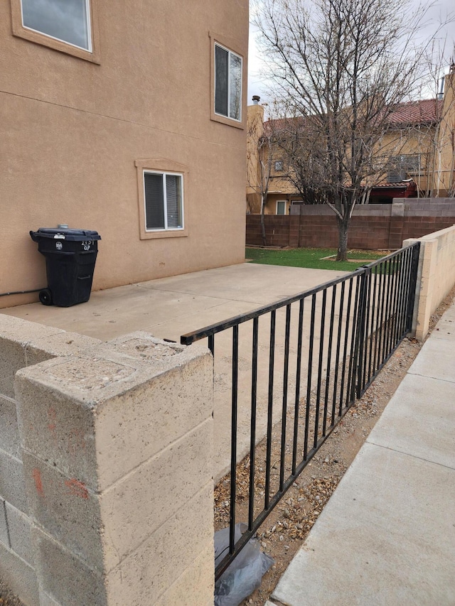 view of patio / terrace with fence