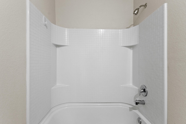 full bathroom with shower / tub combination