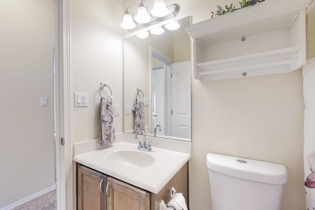 half bath with vanity and toilet