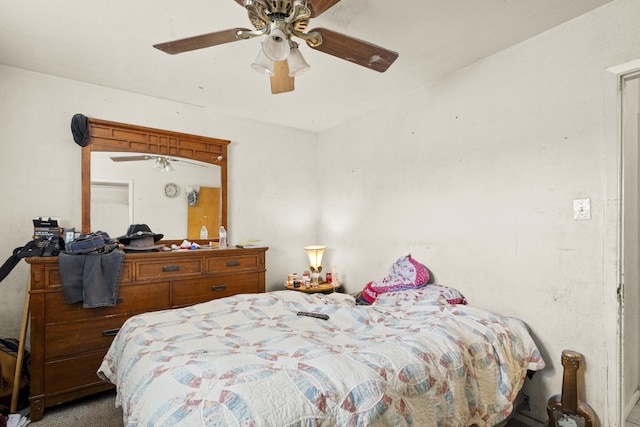 carpeted bedroom with a ceiling fan