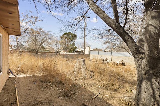 view of yard featuring fence