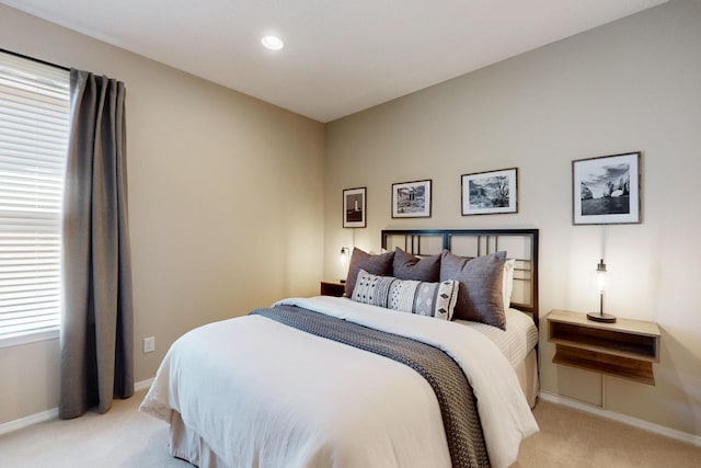 bedroom with carpet floors, baseboards, and recessed lighting