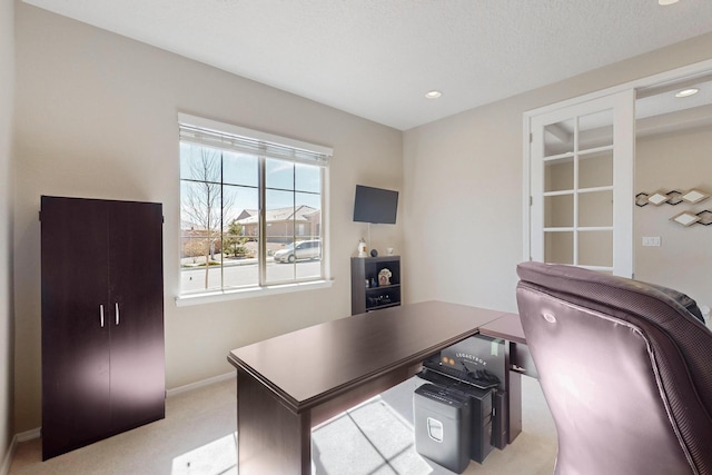 home office featuring carpet floors, recessed lighting, and baseboards