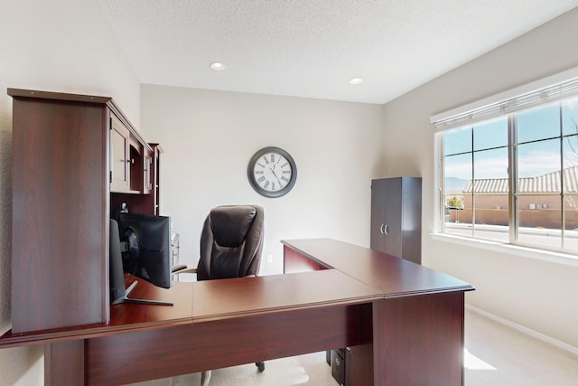 home office featuring carpet floors, baseboards, a textured ceiling, and recessed lighting