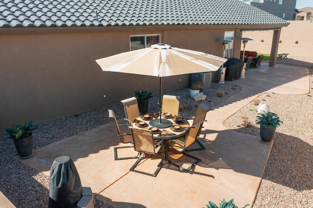 view of patio with outdoor dining space