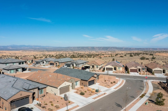 birds eye view of property featuring a residential view and a mountain view