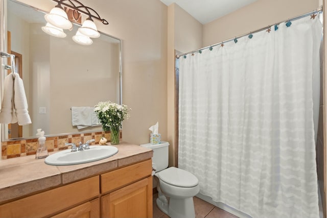 full bath featuring vanity, curtained shower, tile patterned flooring, and toilet