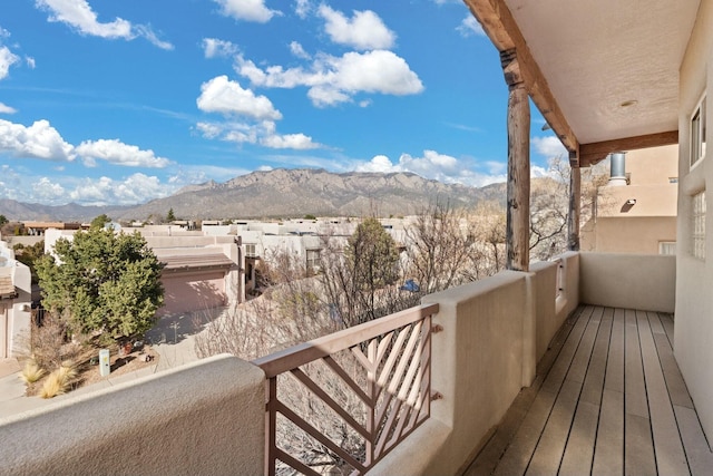 balcony featuring a mountain view