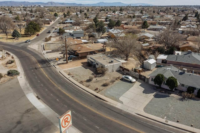 bird's eye view featuring a residential view and a mountain view