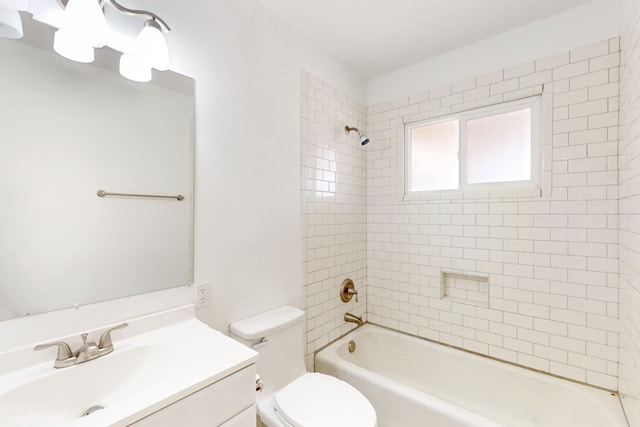 full bathroom featuring toilet, tub / shower combination, and vanity