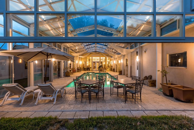 927 Camino Vista Rio, Bernalillo, NM 87004 - view of patio / terrace featuring an outdoor pool, outdoor dining space, and a lanai