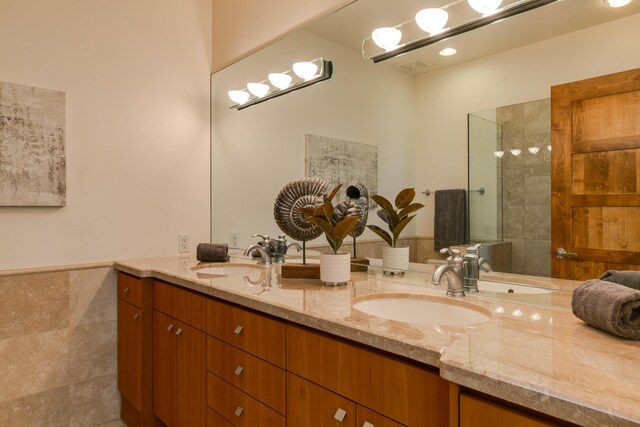 927 Camino Vista Rio, Bernalillo, NM 87004 - bathroom featuring double vanity and walk in shower